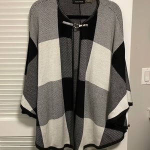 Back and white poncho sweater